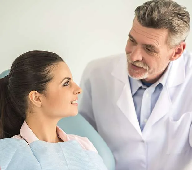 Dentist reviewing a treatment plan with a patient
